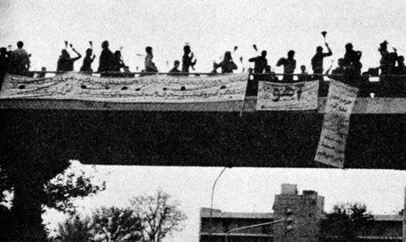 Iran, 1979:  Frenzied worshippers flagellate themselves near the U.S. embassy. 